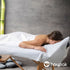 Disposable massage table sheet with face hole